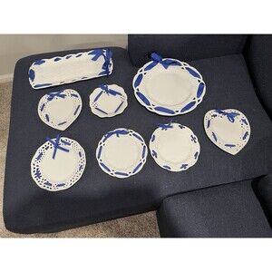 Eight Piece Porcelain Reticulated Blue Ribbon Serving Set .